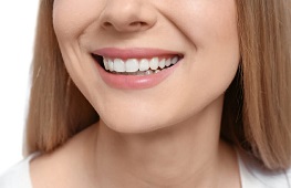 Closeup of woman smiling with white teeth